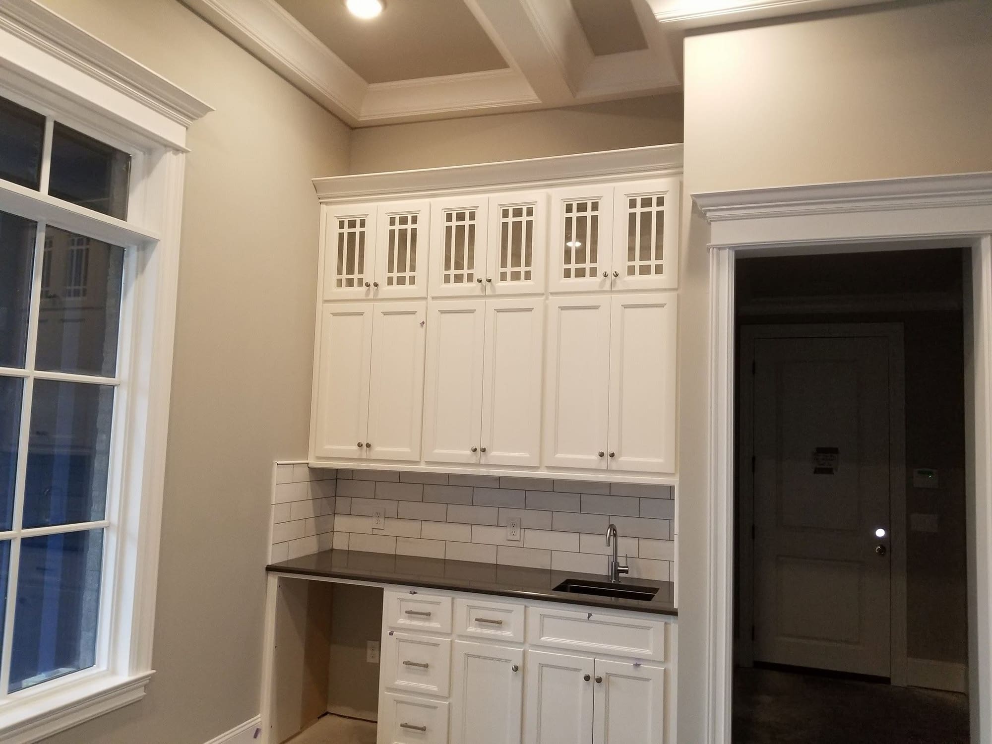 Built-in cabinetry details, project photo supplied by Pope's Painting