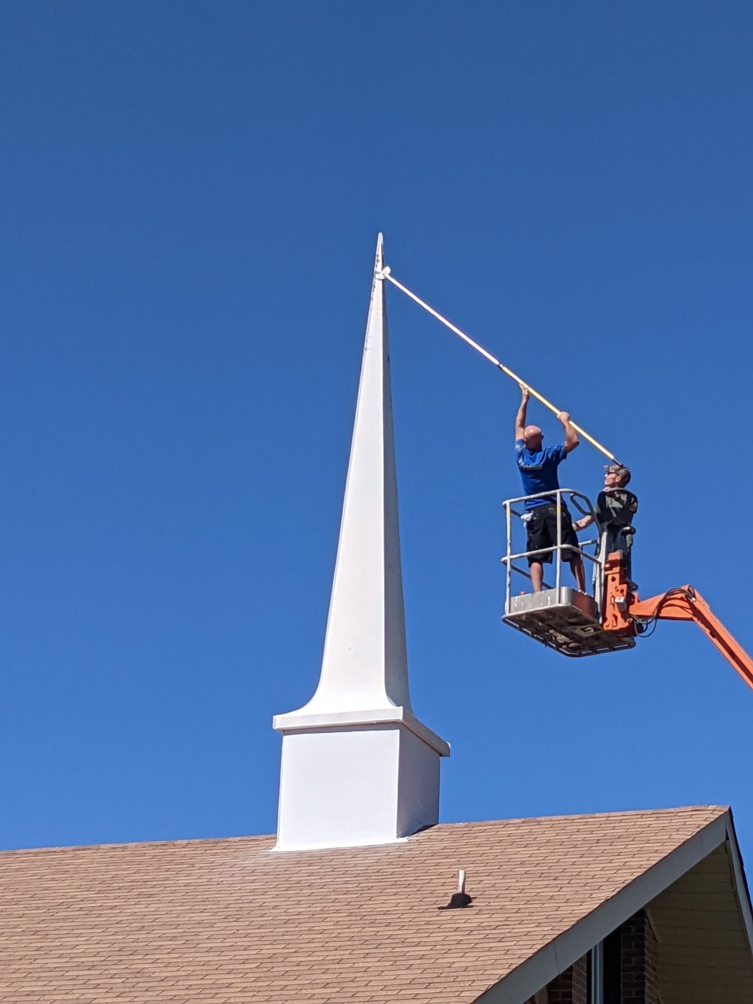 Steeple painting in progress, project photo supplied by Pope's Painting